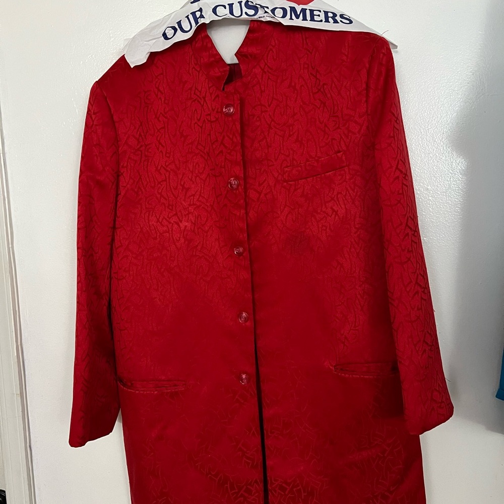 Newly worn red Lucelli suit.